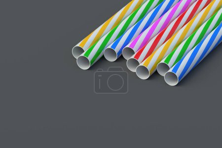 Striped paper straws. Festive accessories for cocktails. Party equipment. Stiff tube for beverages. Copy space. 3d render
