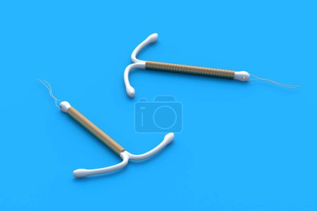 Two birth control devices on blue background. T-shape female contraceptive. Intrauterine device with coil. Sex education. Prevention method and contraception. Unwanted pregnancy. 3d render