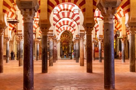 Photo for Exposure done inside the Mezquita (Mosque) of Cordoba is a Roman Catholic cathedral and former mosque situated in the Andalusian city of Cordoba, Spain. - Royalty Free Image