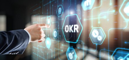 Foto de OKR Objetivo resultado clave negocio tecnología financiación concepto en pantalla virtual. - Imagen libre de derechos