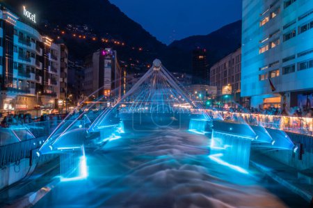 Photo for Andorra La Vella, Andorra : 2023 July 7 : Light and water show in the Capital of Andorra on the Valira River in Andorra La Vella in 2023. - Royalty Free Image