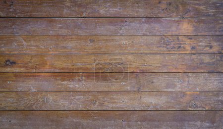 Foto de Wooden planks background wall. Textured rustic wood old paneling for walls, interiors and construction. High quality photo - Imagen libre de derechos