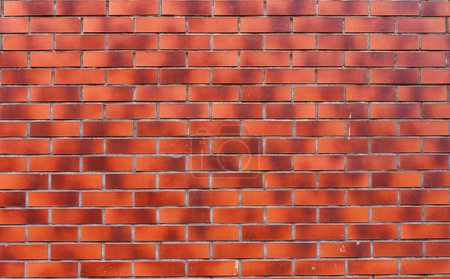 Foto de Brick wall background. Red old bricks masonry backdrop. Stone texture for architecture and interior. High quality photo - Imagen libre de derechos