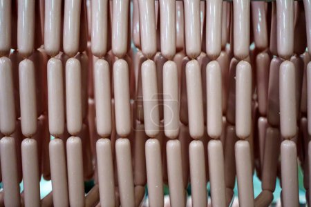 Production of meat sausages. Meat factory and industry. High quality photo