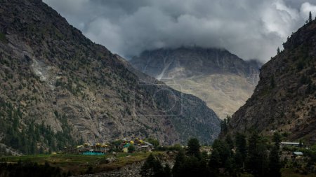 Photo for Lahaul and Spiti, Himachal Pradesh, India - 12 September 2021 : Village in Mountains covered by clouds. - Royalty Free Image