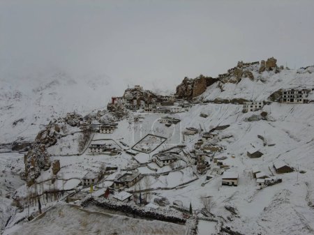 Photo for Spiti, Himachal Pradesh, India - April 7th, 2021 : Winter landscape in a fabulous location, snow covered village in himalayas. - Royalty Free Image