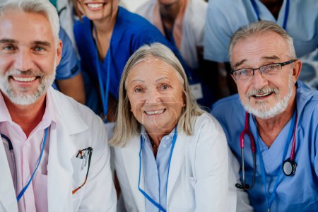 Photo for Portrait of happy doctors, nurses and other medical staff in a hospital. - Royalty Free Image