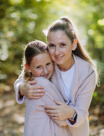 Photo for Portrait of mother with her daughter in a forest. - Royalty Free Image
