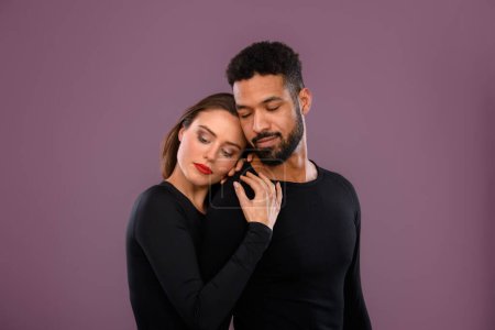 Photo for Portrait of a young multiracial couple, studio shoot. - Royalty Free Image