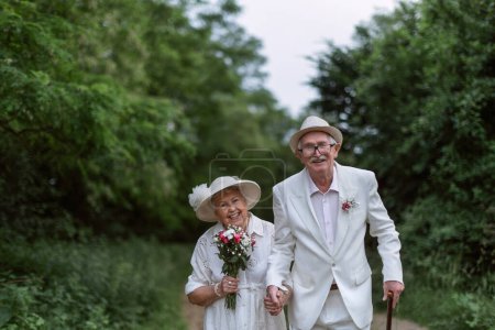 Photo for Senior couple having marriage in nature during a summer day. - Royalty Free Image