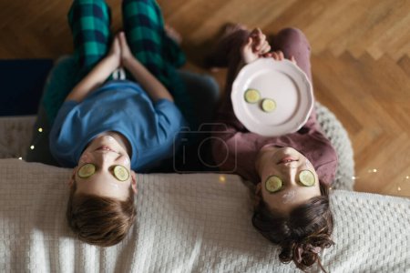 Photo for Best friends having fun during a skincare routine. Gender equality. Siblings spending quality time together. - Royalty Free Image