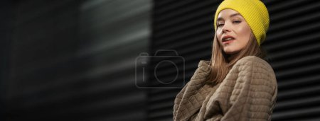 Photo for Portrait of young fashionable woman in city. - Royalty Free Image