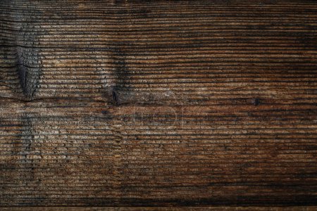Photo for Close-up texture of dark brown wood grain. Natural wooden board background for design and decoration. High-quality image of hardwood surface. - Royalty Free Image