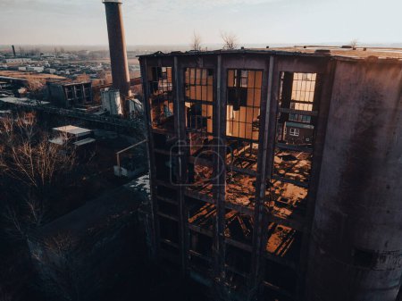 Photo for Aerial view of an old abandoned building, skyscraper in the city. Old derelict building in a bad state. - Royalty Free Image