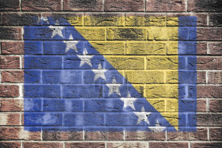 Foto de Una bandera de Bosnia Herzegovina sobre fondo de pared de ladrillo - Imagen libre de derechos