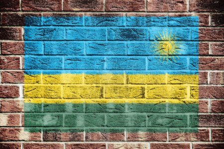 A Rwanda flag on old brick wall background