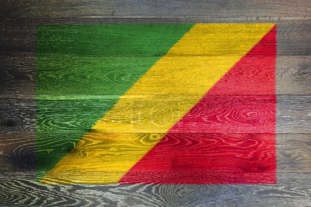Republic of Congo flag on rustic old wood surface background