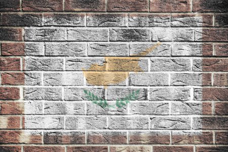 A Cyprus flag painted on brick wall background white gold olive branch