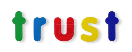 A trust word in coloured magnetic letters on white with clipping path to remove shadow