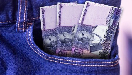 Photo for Bunch of Cambodian riel banknotes in a jeans pocket a concept of spending - Royalty Free Image