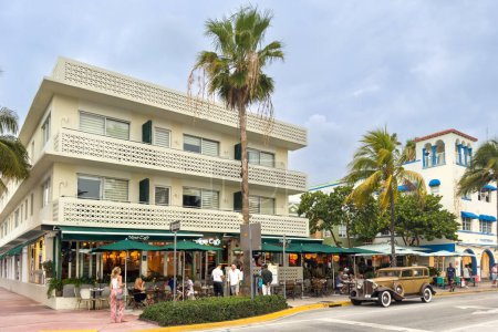 Photo for Miami, Florida - August 25th, 2023: The News Cafe at the historical Art Deco District of Miami South Beach with hotels, cafe and restaurants on the Ocean Drive in Miami Beach. - Royalty Free Image