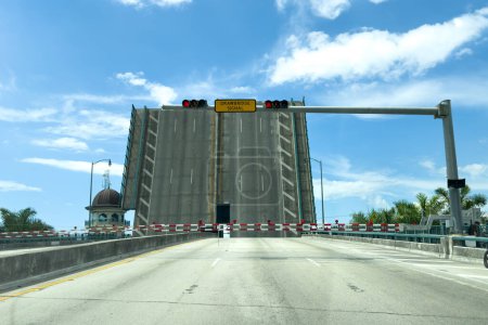 Photo for Miami, Florida - August 25th, 2023: Open bridge and drawbridge signal in district in Miami, Florida, USA. - Royalty Free Image