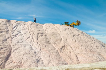 Photo for Trucks unloading raw salt bulk, Salinas Grandes de Hidalgo, La Pampa, Argentina. - Royalty Free Image