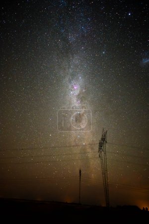 Photo for High voltage power line in a nocturnal landscape, La Pampa, Patagonia, Argentina. - Royalty Free Image