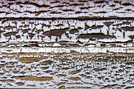 Foto de Detalle de una madera vieja con pintura agrietada - Imagen libre de derechos