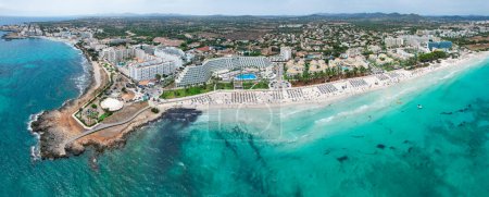 Panoramic aerial view of Sa Coma beach in Mallorca Spain on a summer day