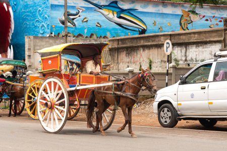 Photo for Mysore Karnataka India- September 1 2022 Iconic horse carriages being run by locals to ferry tourists and locals in and around mysore city in Karnataka  India - Royalty Free Image
