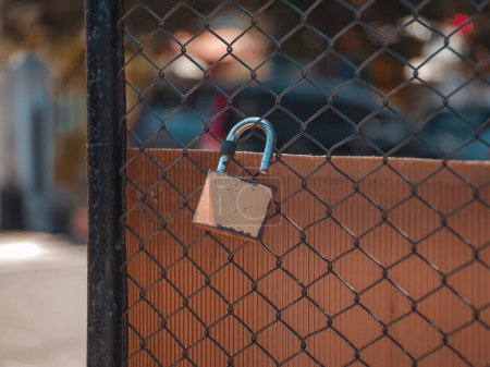 Photo for Fence padlock in open condition. home environment security concept. open key concept - Royalty Free Image