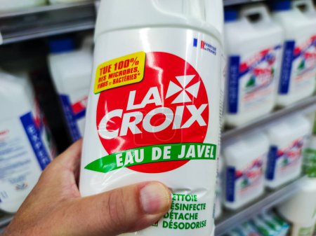 Photo for Puilboreau, France - October 14, 2020:Hand Selecting Household Cleaning Product "La croix" brand in a French Supermarket - Royalty Free Image