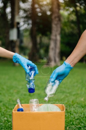 Photo for Eco activists cleaning park from garbage. pollution and ecology concept - Royalty Free Image
