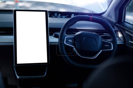 Foto de Monitor in EV car with isolated blank screen use for GPS. Isolated on white with clipping path. Car display with blank screen. car interior details. - Imagen libre de derechos
