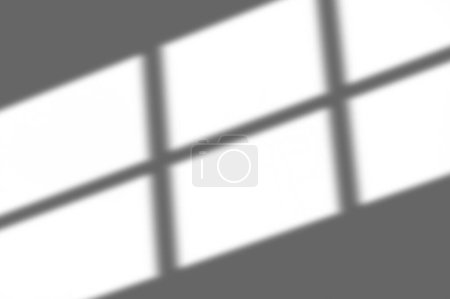 Photo for Abstract shadow of the window in light on white wall texture blur background - Royalty Free Image