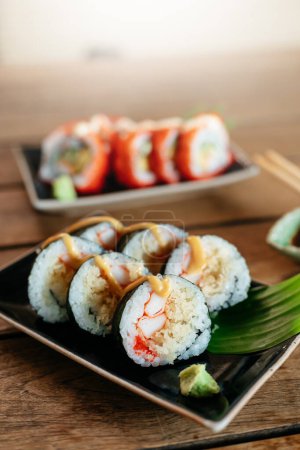 Foto de Sashimi, Sushi salmon & tuna sushi shrimp and wasabi on the wood table. Japanese food - Imagen libre de derechos