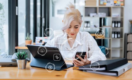 Photo for SDK  Software development kit programming language technology concept, woman with laptop computer and phone with SDK icon on virtual screen - Royalty Free Image