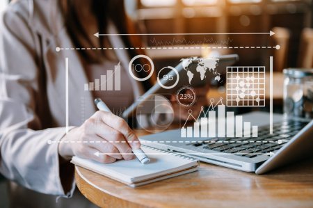 Photo for Businesswoman manager working and update tasks and Gantt chart scheduling virtual diagram.with  tablet pc and laptop - Royalty Free Image