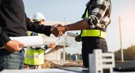Photo for Construction team shake hands greeting start new project plan - Royalty Free Image