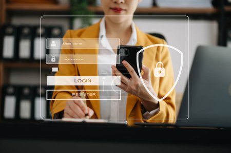 Photo for Cyber security concept, Login, User, identification information security and encryption, secure access to user's personal information woman using smartphone and laptop in office - Royalty Free Image