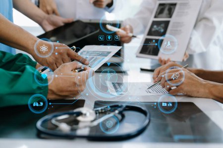 Photo for Medical technology network team meeting concept. Doctors working with  digital tablet and laptop computer with graphics chart interface, with virtual icon diagram - Royalty Free Image