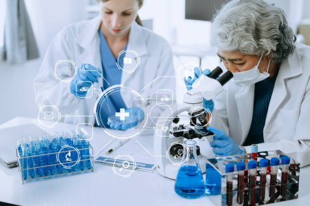Photo for Scientist two woman with tablet and laptop, laboratory and ecofriendly science. Agriculture, research and scientists with online reading, test samples for global warming, analytics and tech. with virtual ico - Royalty Free Image