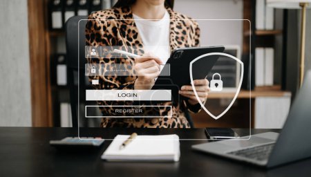 Photo for Cropped image of business woman wearing leopard jacket, sitting at office table and using digital tablet. login concept - Royalty Free Image
