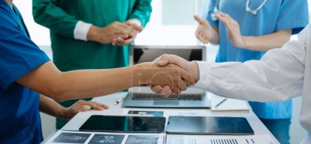 Photo for Team doctors and nurses union coordinate hands. Teamwork Concept in hospital for success and trust in the team. Medical industry - Royalty Free Image