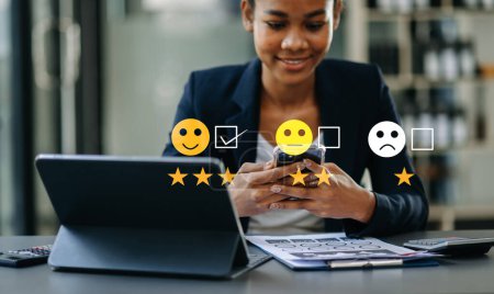 Photo for Customer service evaluation concept. Woman show face smile emoticon show on virtual screen. - Royalty Free Image
