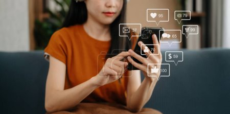 Photo for Social media and Marketing virtual icons screen concept. close up of businesswoman typing on smartphone - Royalty Free Image