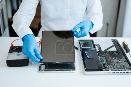 Photo for Electronic engineering electronic repair, repairman repairing and maintenance concepts, checking and upgrade in shop - Royalty Free Image