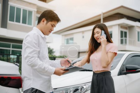 Photo for Customers and car insurance agents have entered into agreements and signed documents to claim compensation after on the road - Royalty Free Image