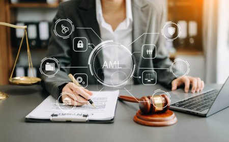 Photo for AML Anti Money Laundering Financial Bank Business Concept. judge in a courtroom using laptop. AML anti money laundering icon - Royalty Free Image